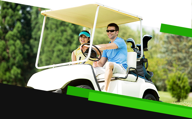 Man and woman on golf cart