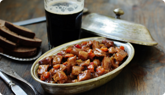 Sun shining over an apple orchard